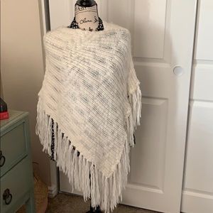 Off white poncho with fringe